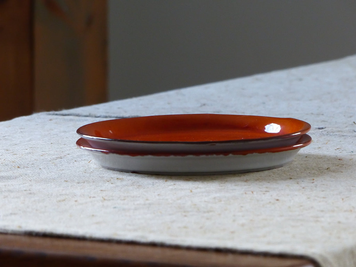 Duo d'assiettes vintage en terre cuite, orangées
