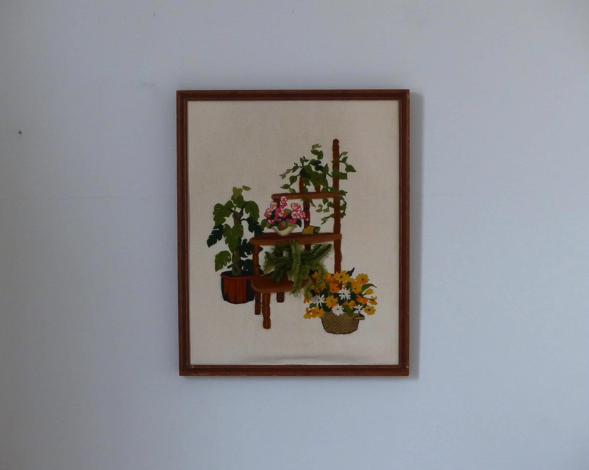 Cadre vintage avec broderie de plantes-vertes