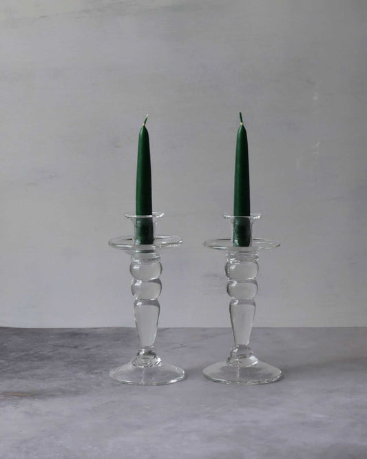 Le duo de bougeoirs en verre vintage